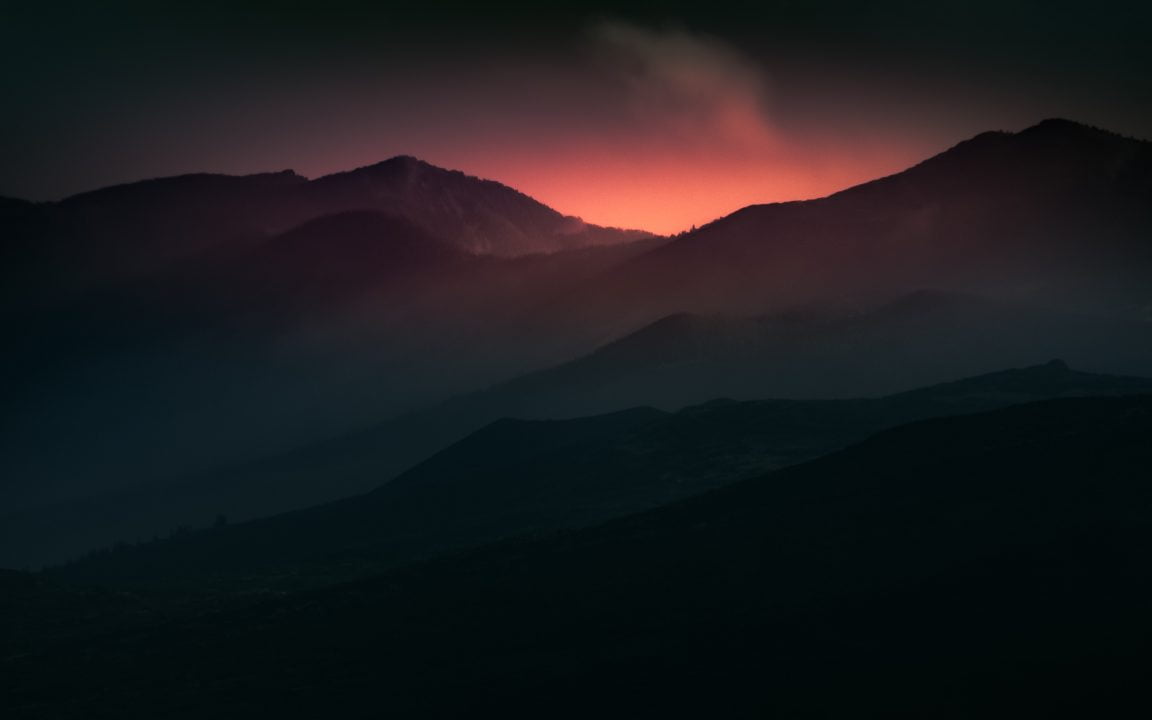 Foggy mountains just before sunrise